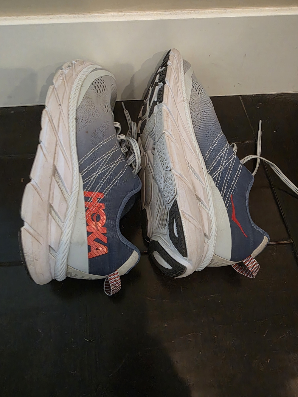 Hoka One One Navy Blue Sneakers with Orange Logo Accents